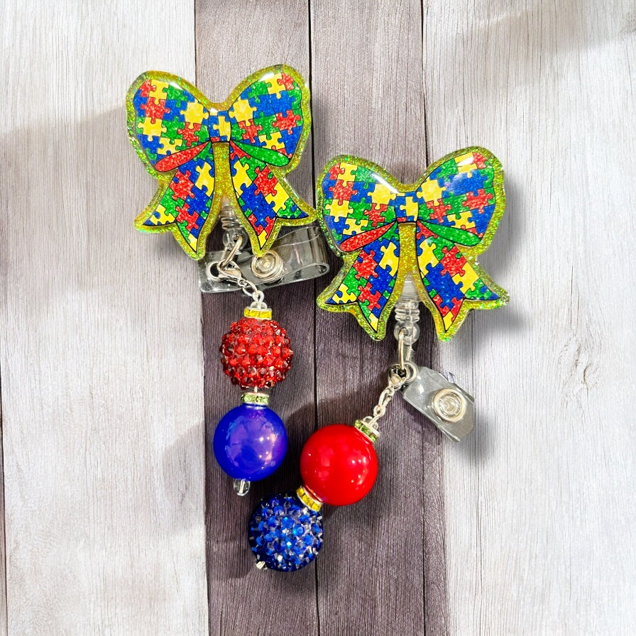 Autism Puzzle Bow Awareness Badge Reel