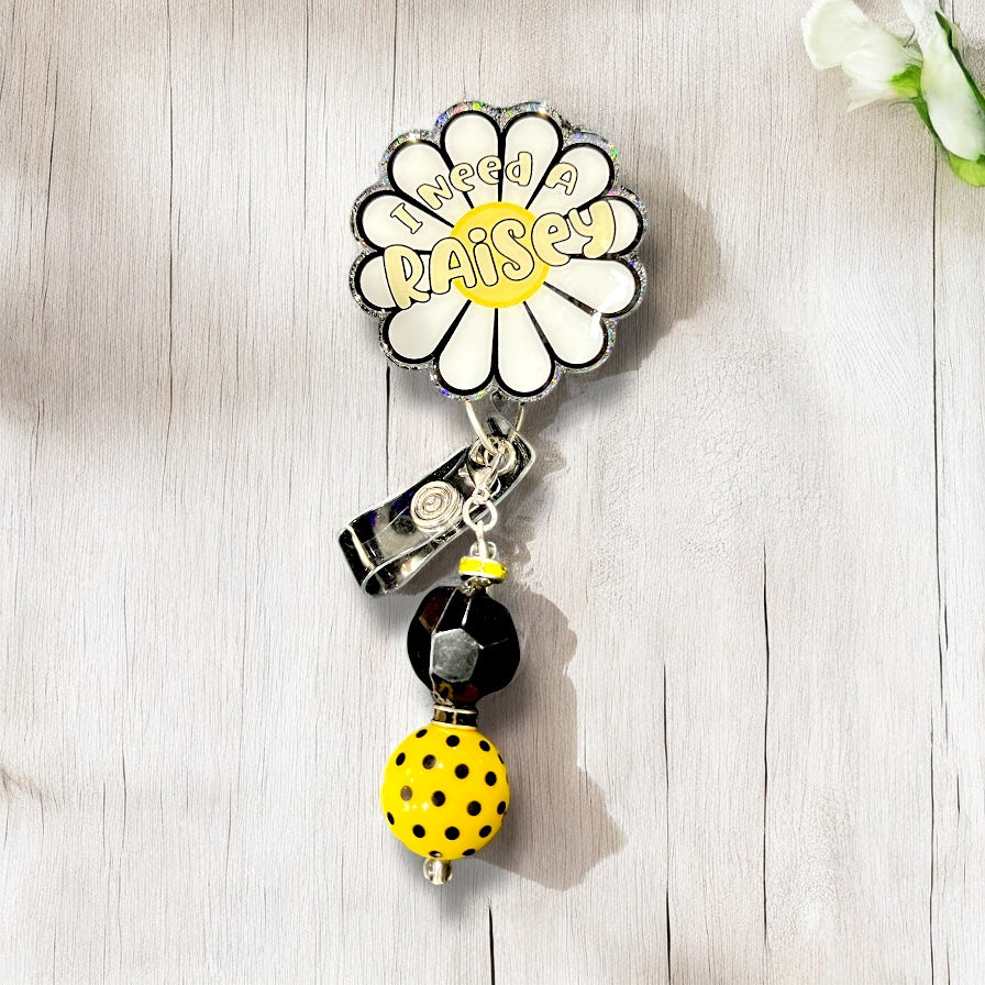 I Need A Raisey Badge Reel
