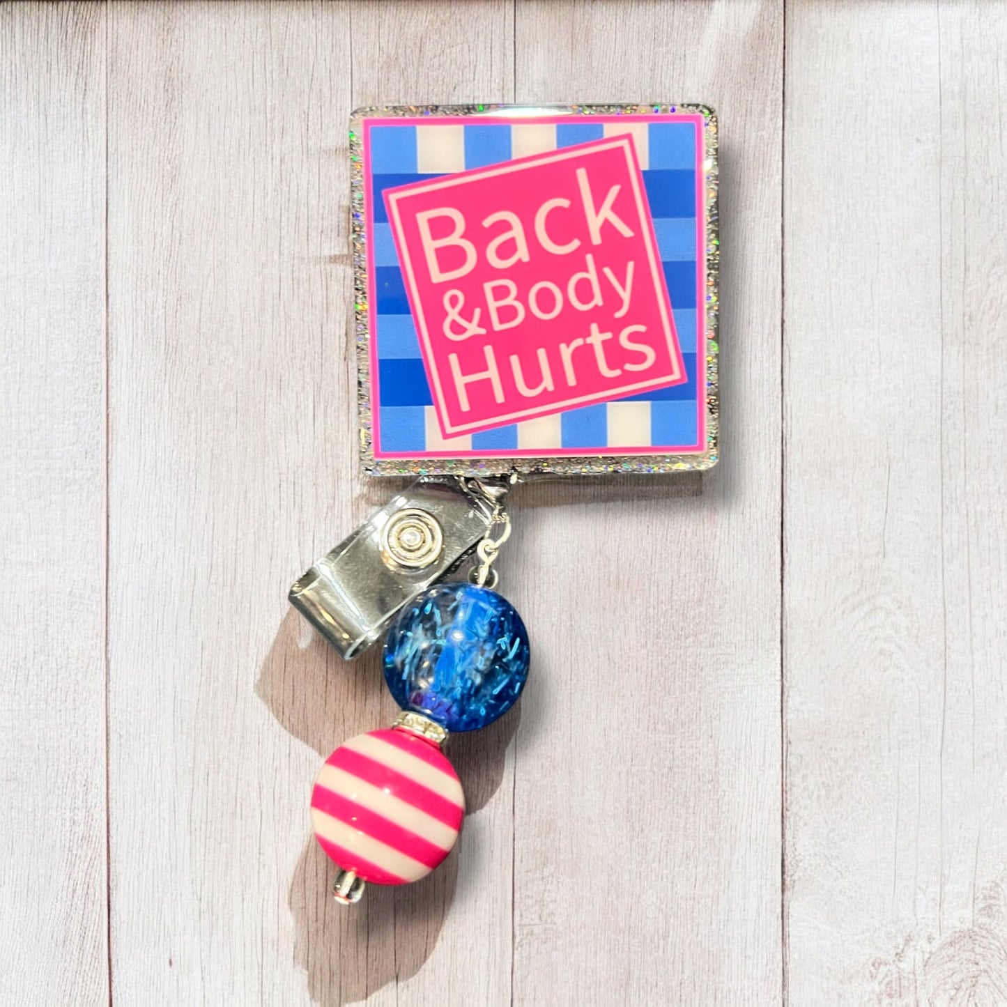 Back and Body Hurts Badge Reel