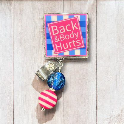 Back and Body Hurts Badge Reel