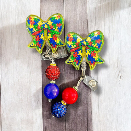 Autism Puzzle Bow Awareness Badge Reel
