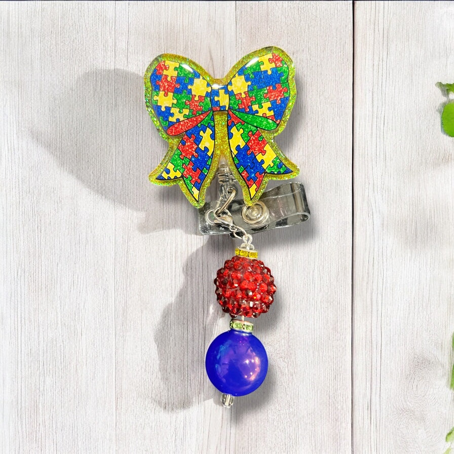 Autism Puzzle Bow Awareness Badge Reel
